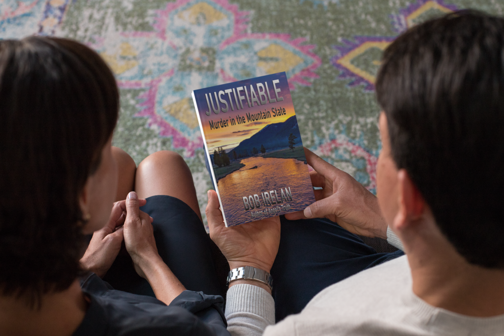 mockup-of-a-woman-and-a-man-holding-a-paperback-book-Justified