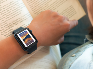 Skipped (woman-wearing-an-apple-watch-and-reading-a-book-mockup-
